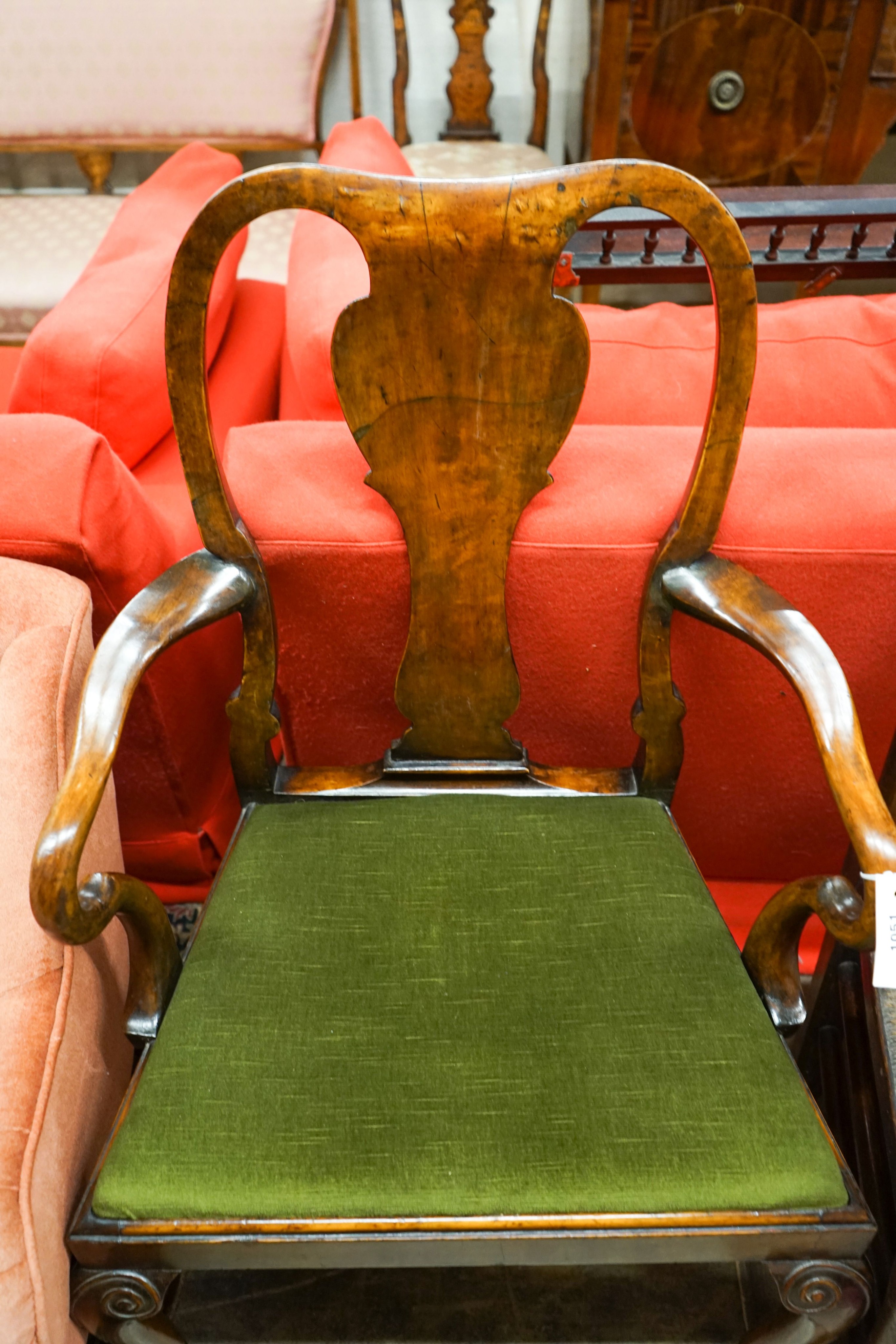 A Queen Anne revival walnut elbow chair